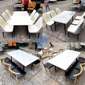 Băn ăn mặt đá có thể kết hợp với một số mẫu ghế bọc da cực kỳ ấn tượng